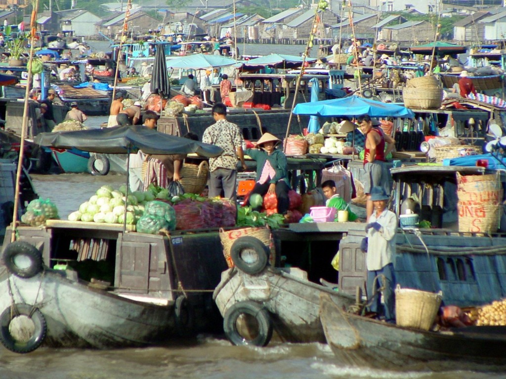 Cai Be floating market on Mekong  River Delta, Southern Vietnam.