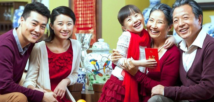Three generations of Vietnamese people in Tet