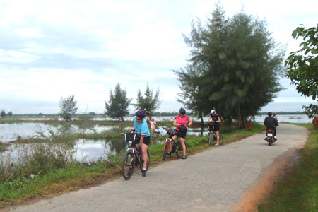 Cycling through the passes to Lang Co beach, Hue