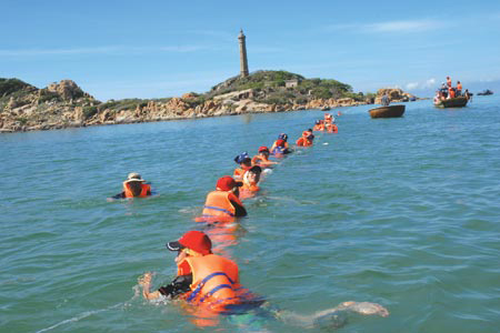 Swimming in the clean water of Ham Thuan Nam Beach