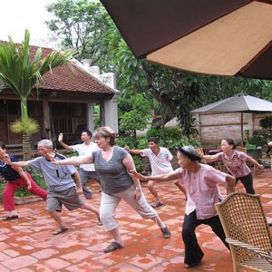 morning exercise at moon garden homestay north vietnam tour