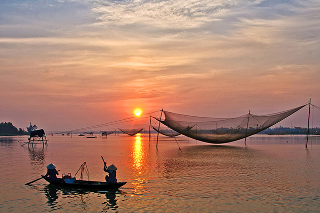 the sunset at cua dai beach