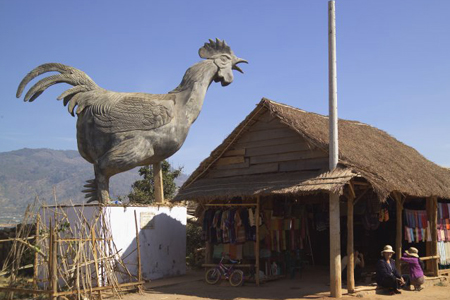 A statue of chicken in Lat Village