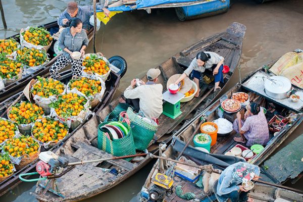 cai be floating market mekong delta vietnam