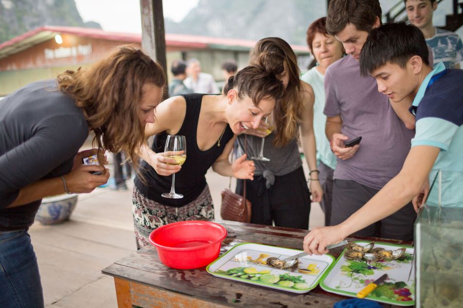 cooking demonstration in halong bay - vietnam luxury tours