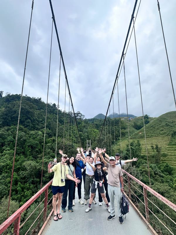 happy guest with best vietnam tour company