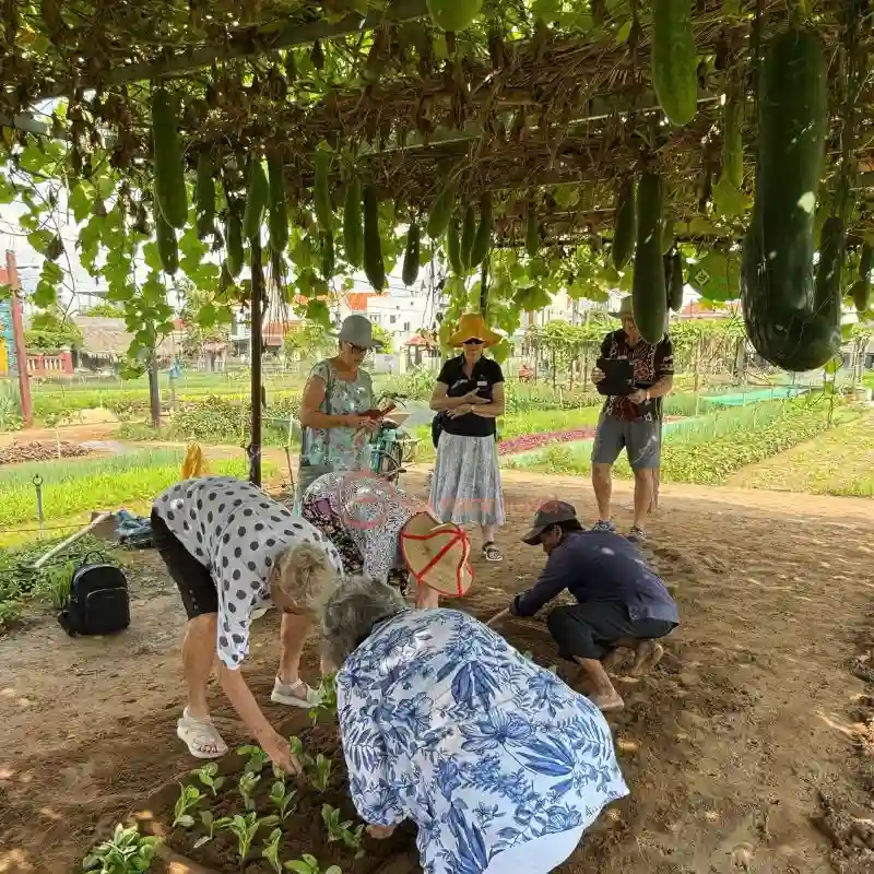 Vietnam local tour operators includes rural life experiences such as gardening with local farmers.